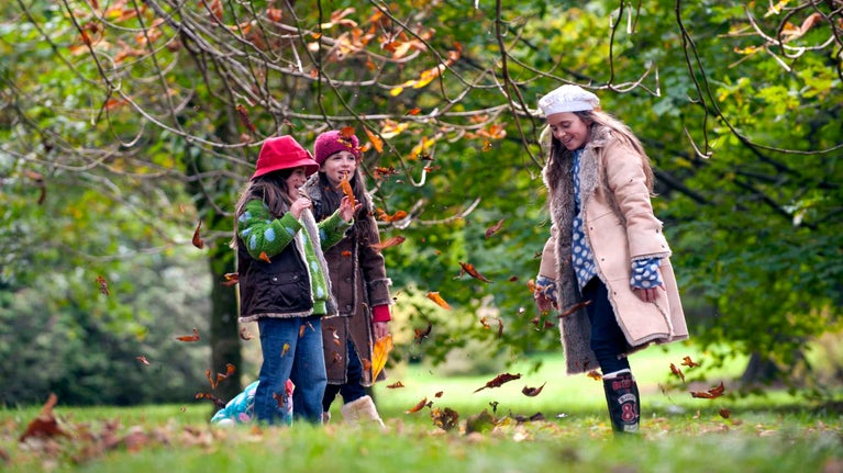 Three girls in the autumn garden at Rowallane, County Down
